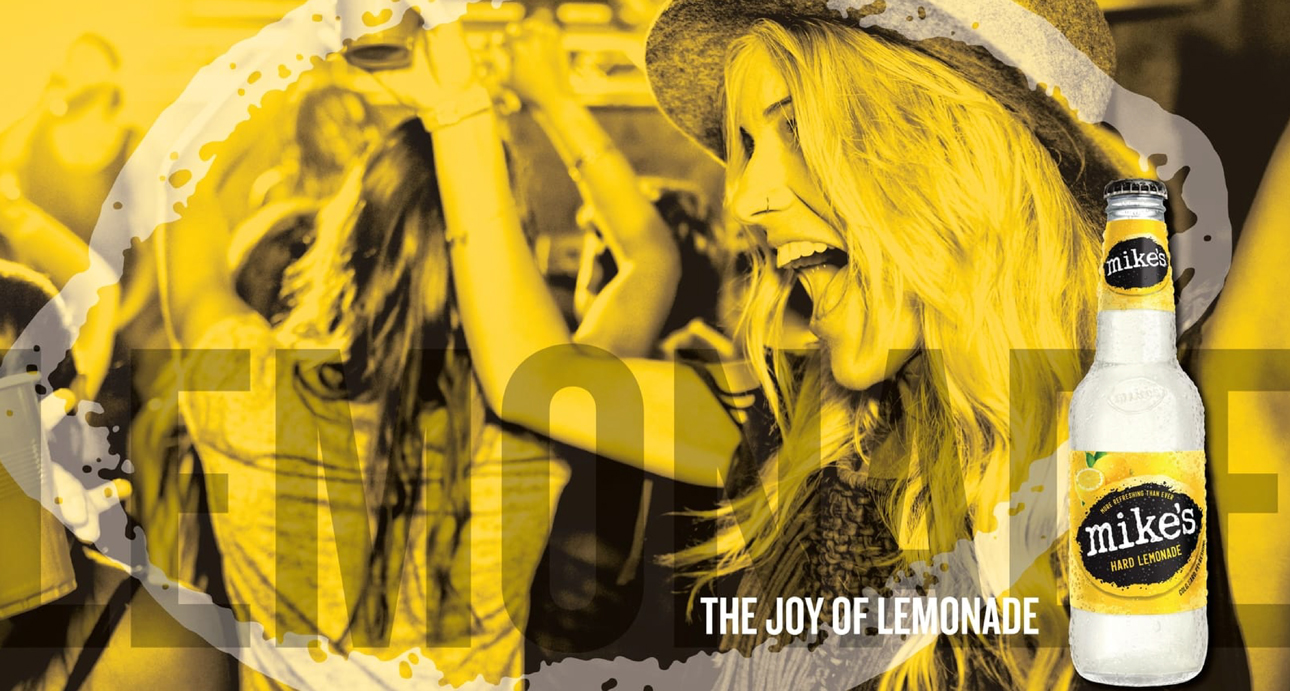 Mike's Hard Lemonade lifestyle graphic with a woman enjoying the drink.
