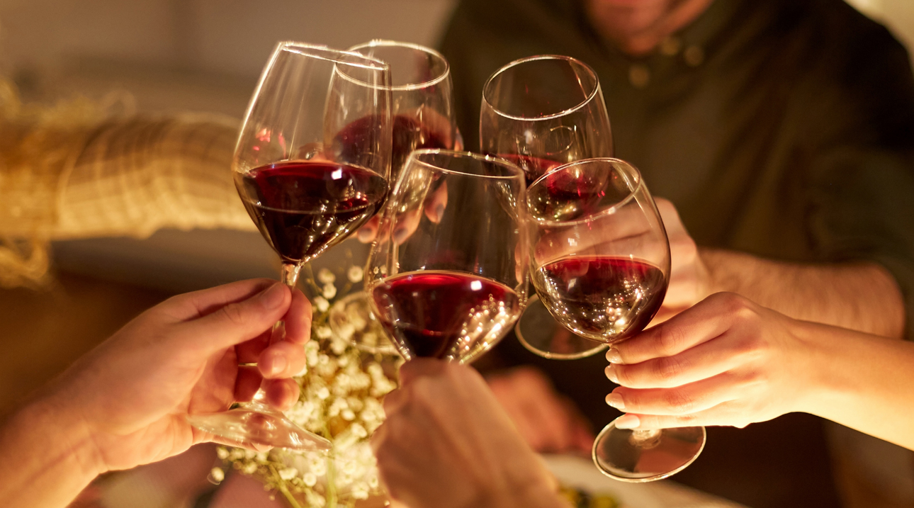 Simi Winery glasses cheers with red wine.