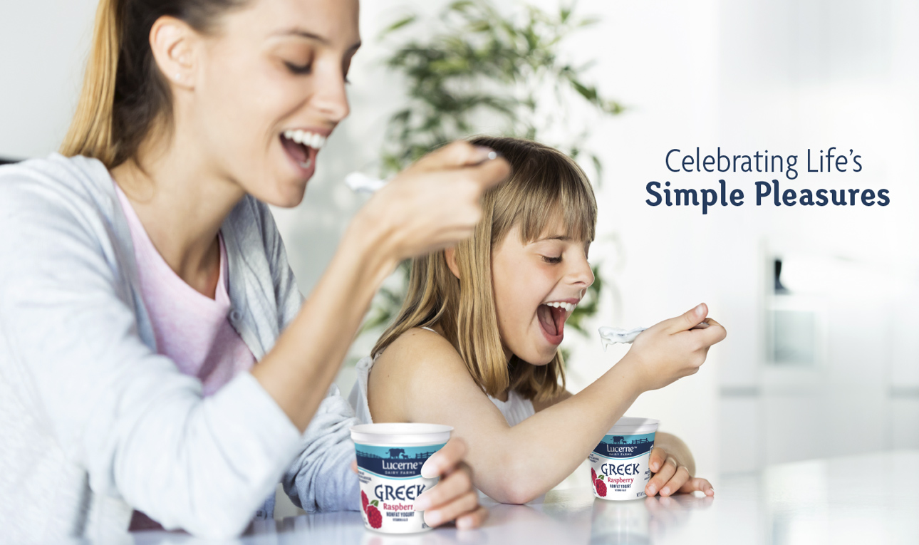 Lucerne Dairy Farms, woman and chile eating yogurt with headline, Celebrating Life's Simple Pleasures.